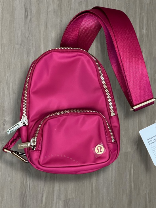 lululemon athletica Handbags - Lululemon Everywhere Sling Bag 2L Berry Rumble Gold Hardware Accents NWT